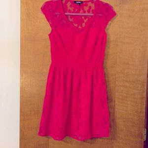 Hot pink lace mini dress. Very 90s.